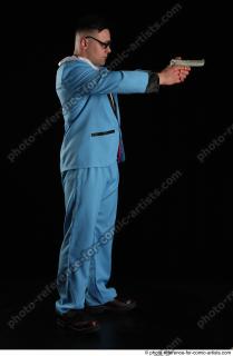 06 2018 01 MICHAL AGENT STANDING POSE WITH GUN